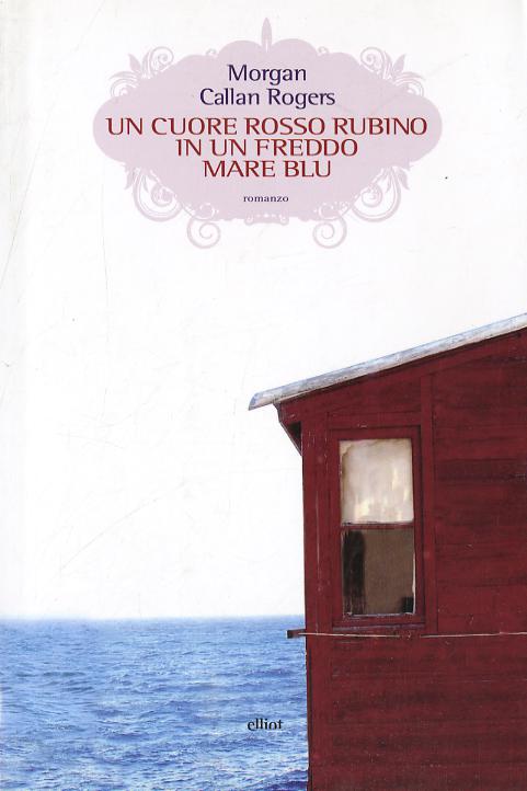 Cuore rosso rubino in un freddo mare blu
